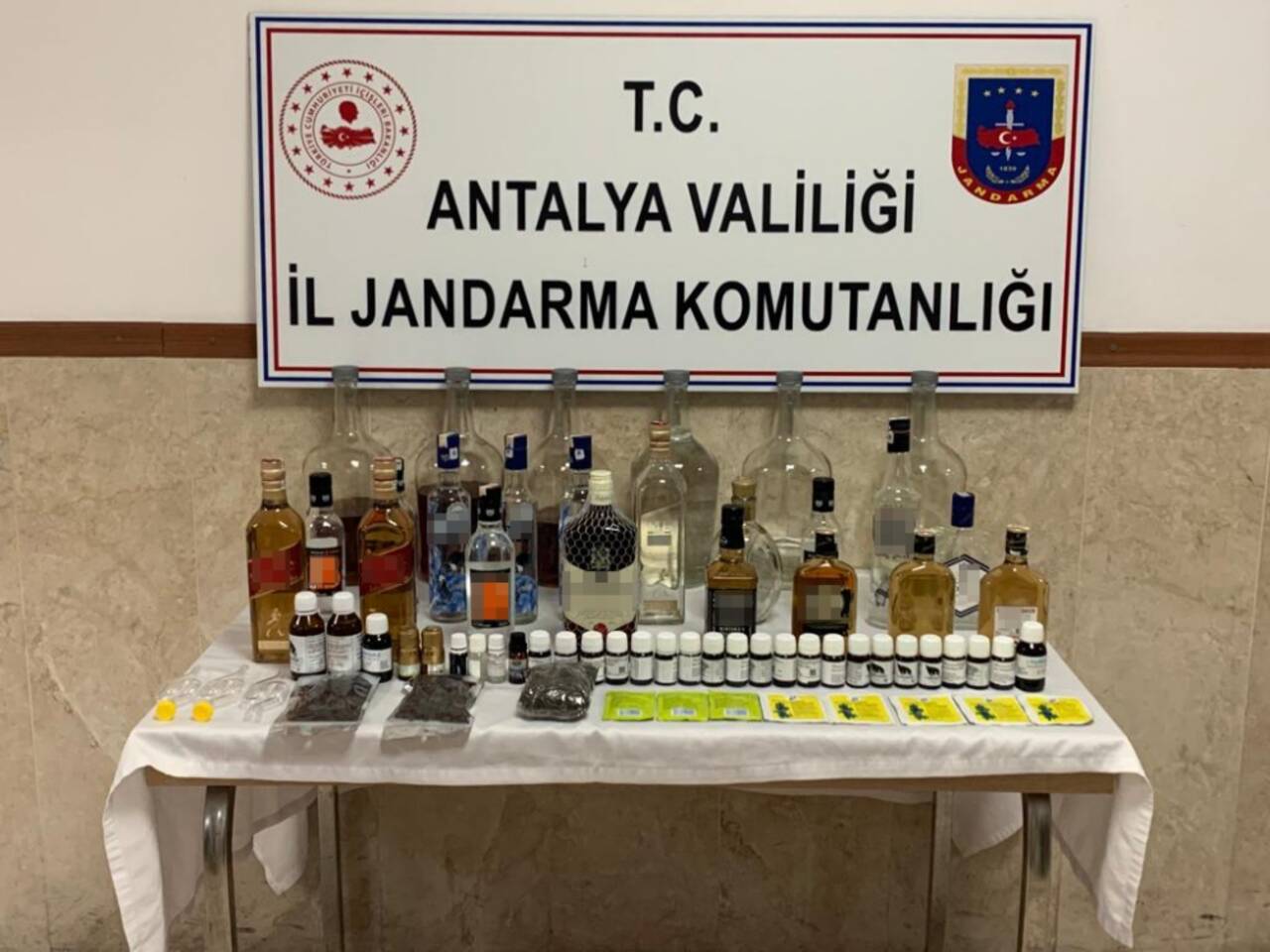 Antalya'da evinde sahte içki üreten kişi gözaltına alındı