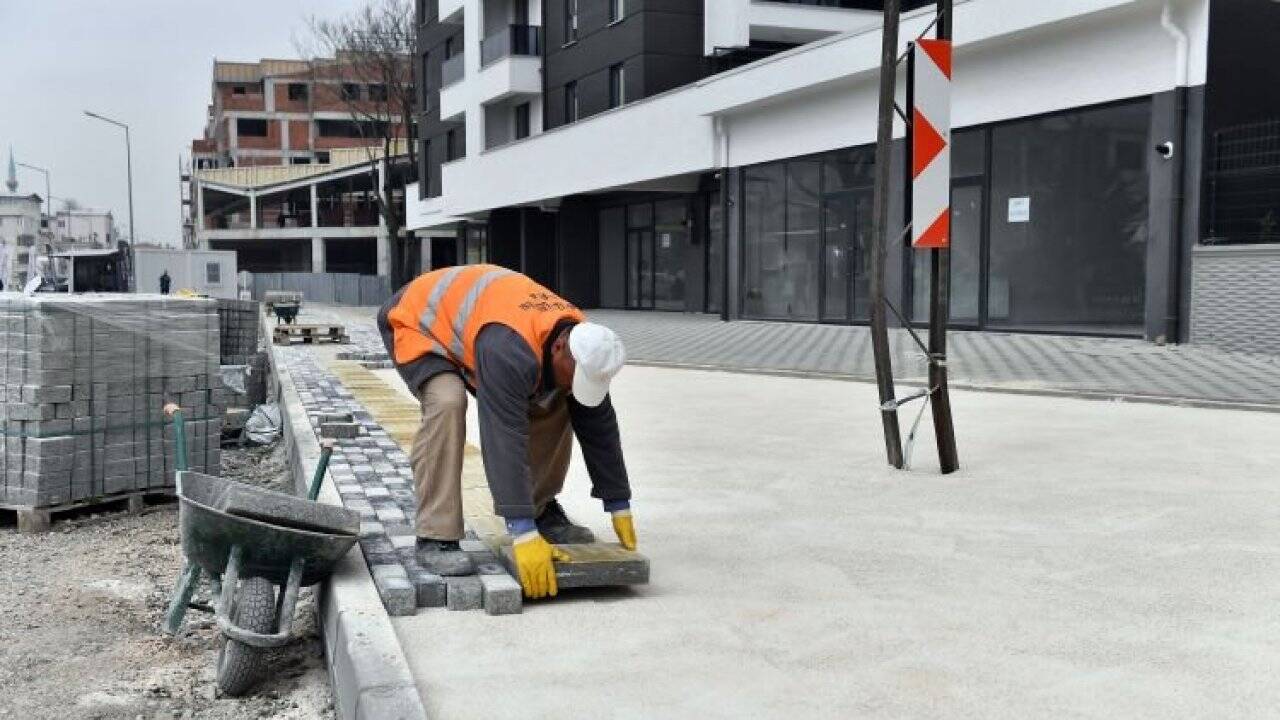 Bursa Osmangazi'de açılan yollarda kaldırım ve asfalt çalışmaları tamamlandı