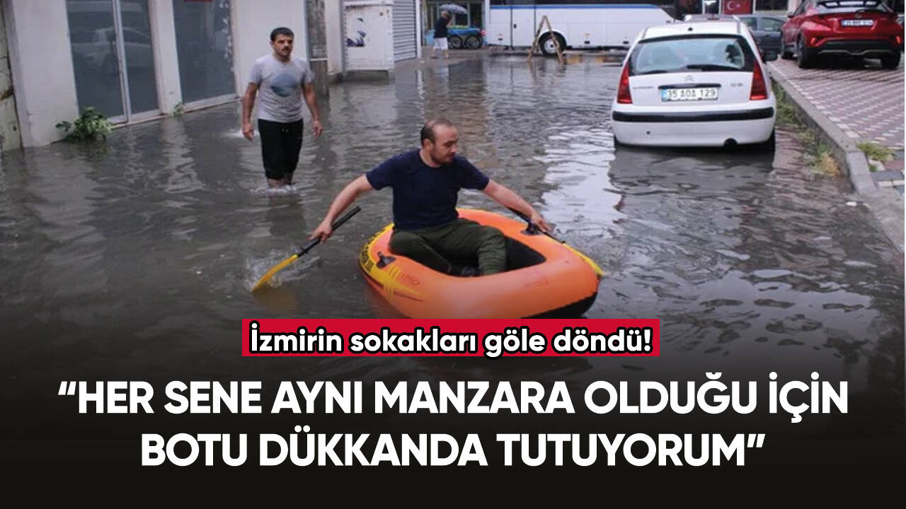 Yağış sonrası sokaktan kürek kullanarak botla geçti