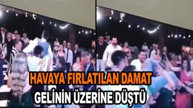 Nişanda havaya fırlatılan damat, gelinin üzerine düştü