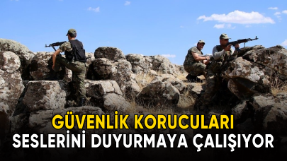 Güvenlik korucuları seslerini duyurmaya çalışıyor