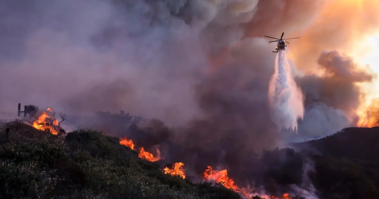 Wind-whipped fire in L.A. prompts evacuations in Pacific Palisades