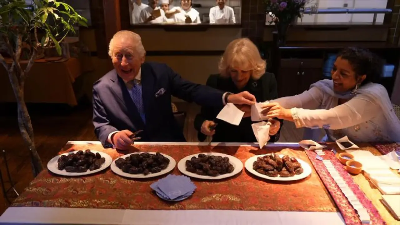 King and Queen help pack donation boxes ahead of Ramadan.